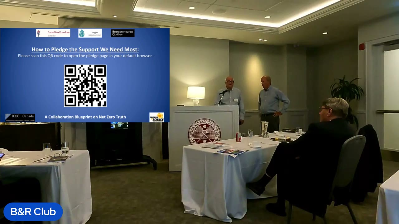Speakers at the front of the room at the Toronto event
